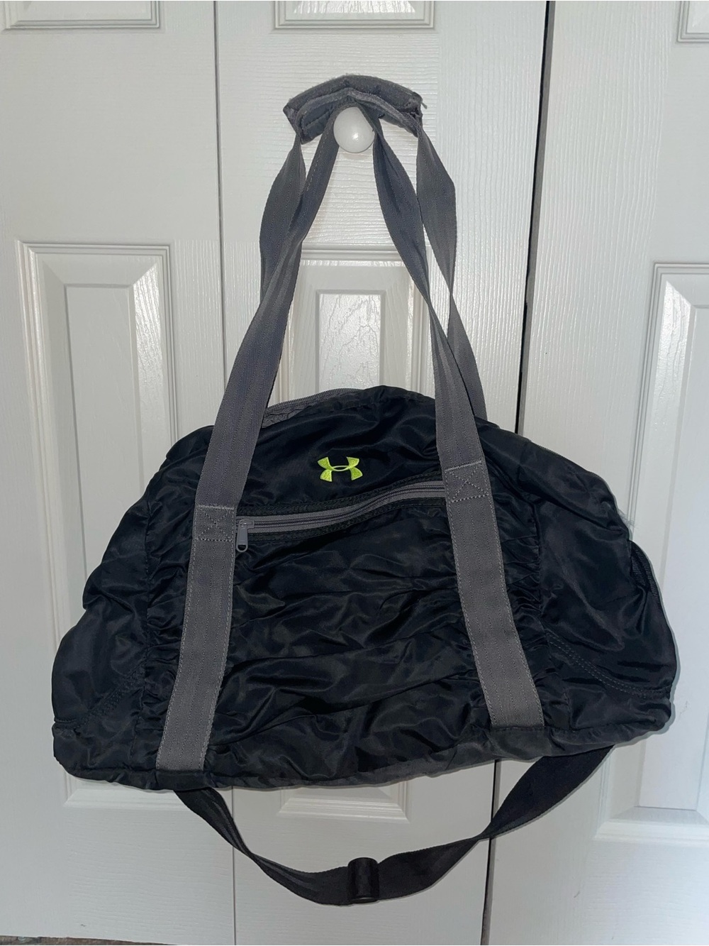 Under Armour Black Duffel with Gray Straps and Neon Green Logo